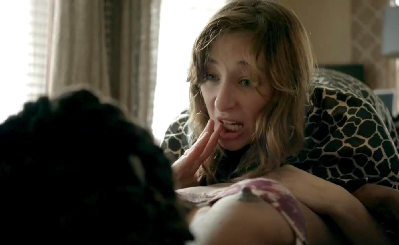 Shanola Hampton lying on her back in bed receiving oral sex from Isidora Goreshter