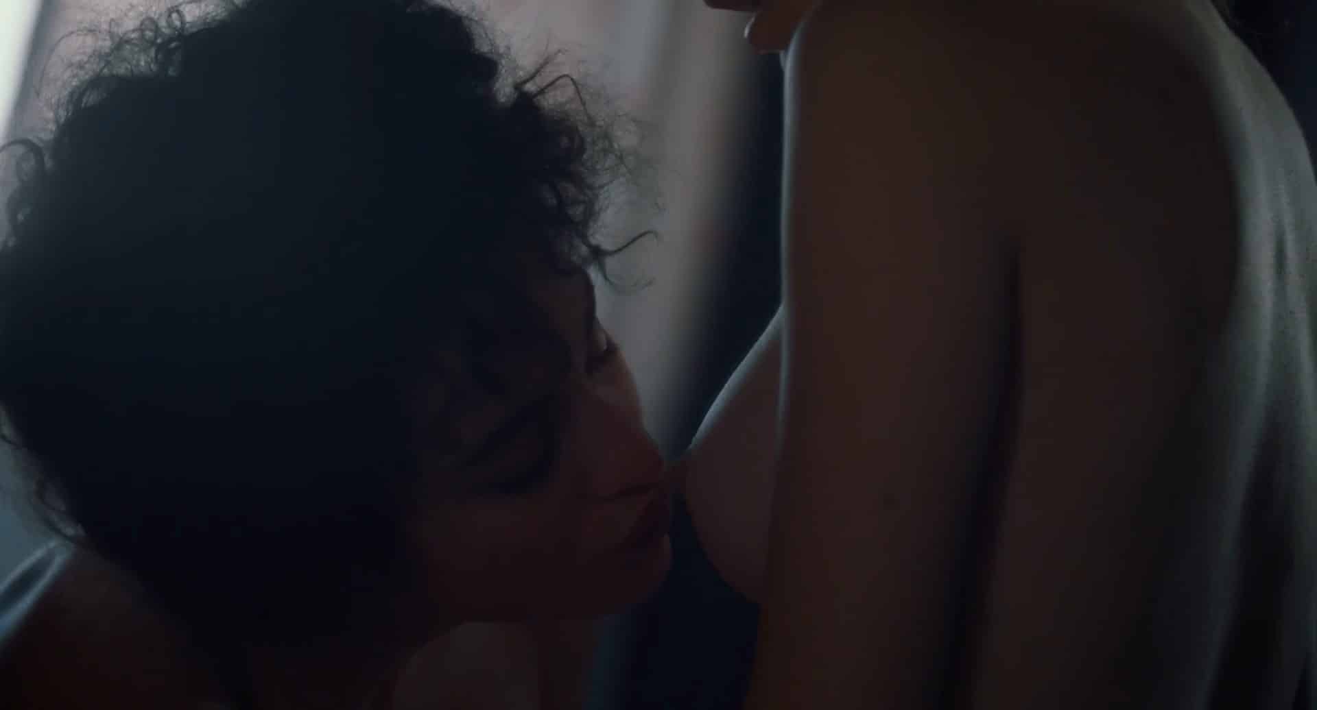  Camelia Jordana leaning over to suck on Noemie Merlant’s nipple in this lesbian scene